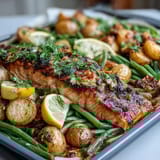 Healthy Easy Sheet Pan Salmon with Green Beans and Potatoes: a colorful one-pan dinner with juicy salmon, golden potatoes, and crisp green beans roasted with lemon and herbs.